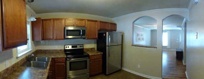 Building Photo - End Unit with Lots of Upgrades!