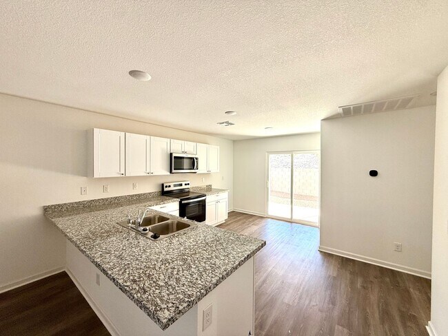 Building Photo - Beautiful 2024 Build 3 Bedroom Home- Move ...