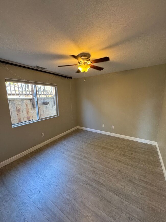 Building Photo - 4-Bedroom Home with Updated Kitchen and Co...