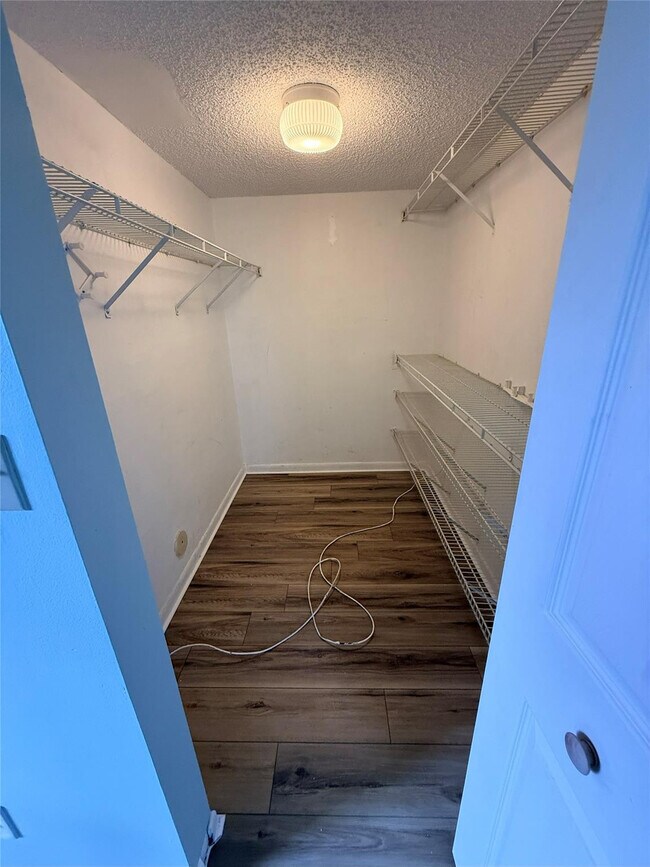 Building Photo - 7406 Woodmont Terrace