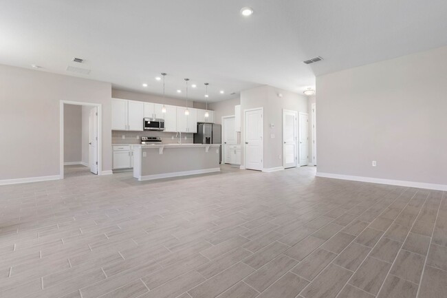 Building Photo - Brand new home for rent! Enjoy a sleek, co...