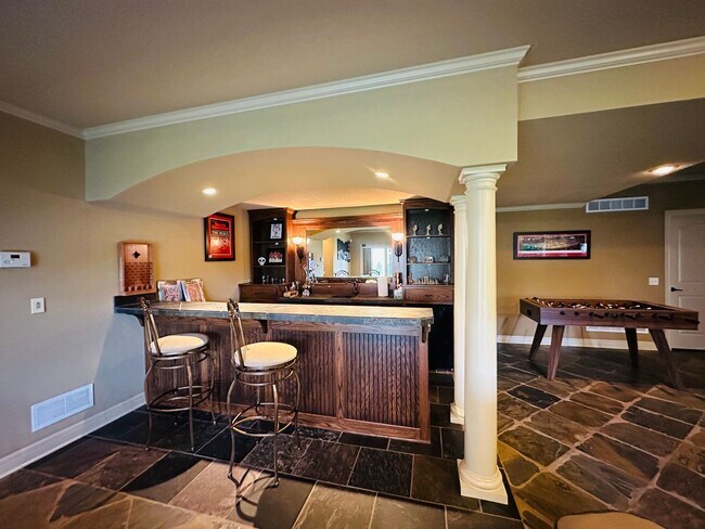 Building Photo - {9003} Wilshire Farms Reverse 1.5 Story Ho...