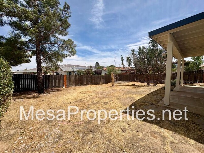 Building Photo - 7891 Corona Ave
