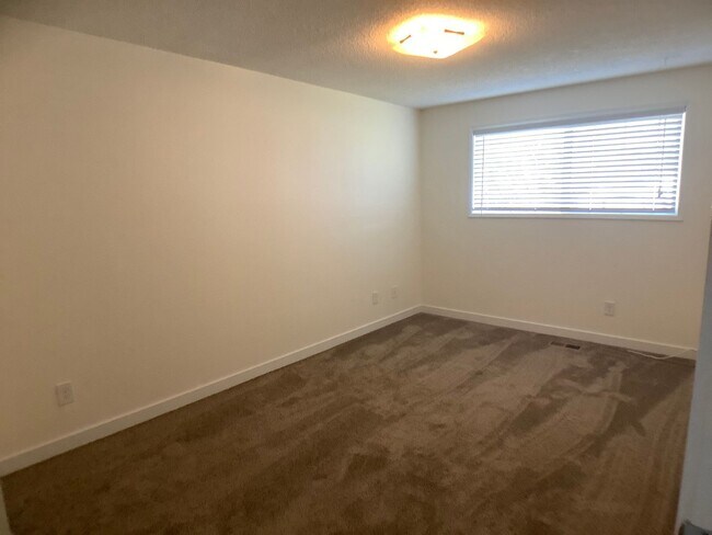 Building Photo - Three bedroom home with large yard| Available July!