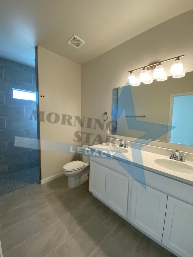 Building Photo - NEW CONSTRUCTION AND FULLY LOADED