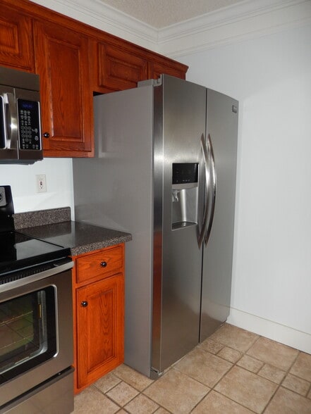 Kitchen with Stainless Steel Appliances - 2065 Pinemount Blvd