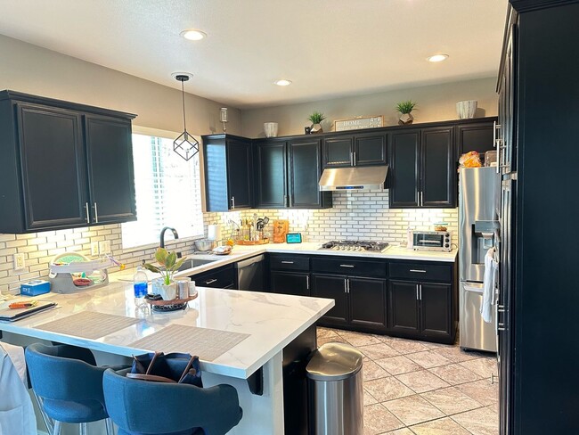 Building Photo - Smart 3-Bedroom Home with Solar & 3-Car Ga...