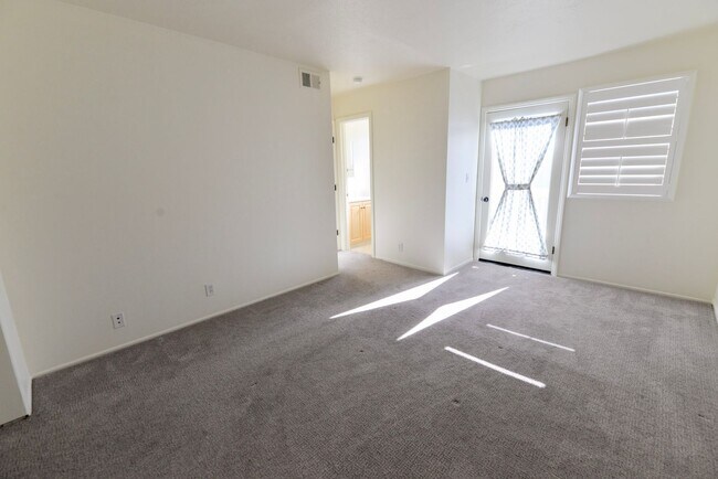 Building Photo - Sunny 2BR/2BA Coastal Retreat — Steps from the Sand with Ocean Breezes