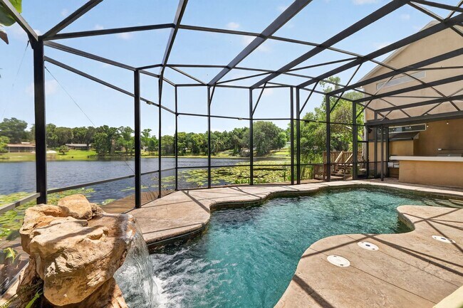 Building Photo - Available Now! Waterfront Living at Its Best – Pool, Decks & Gated Privacy