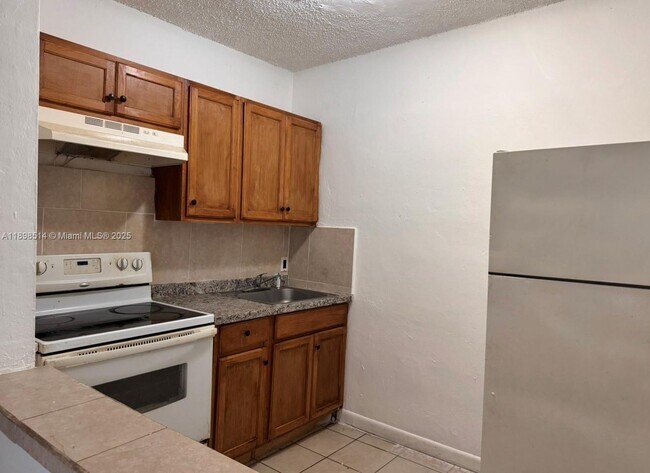 Building Photo - 1601 NW 62nd St