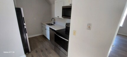 Building Photo - Menard Apartments