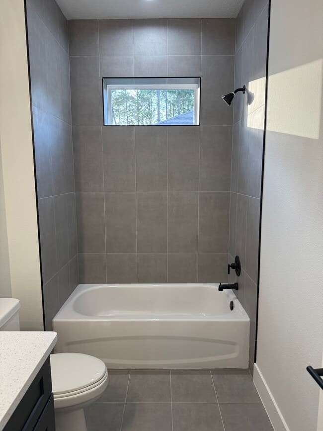 Building Photo - Brand new 3/2/2 with fenced in yard and a screened in porch! 50% off first month rent!