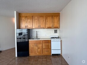 Building Photo - Upgraded studio at the Holiday Village $16...