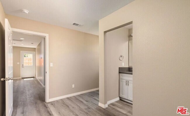 Building Photo - 9219 Langdon Ave