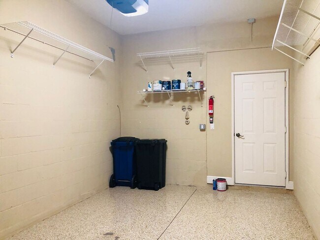 Building Photo - Experience Bell Tower Park. GATED ground floor 2 Bed 2 Bath Den 1 Car Garage Condo.