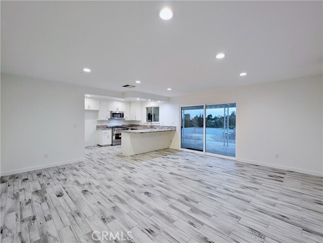 Building Photo - 12319 Woodley Ave