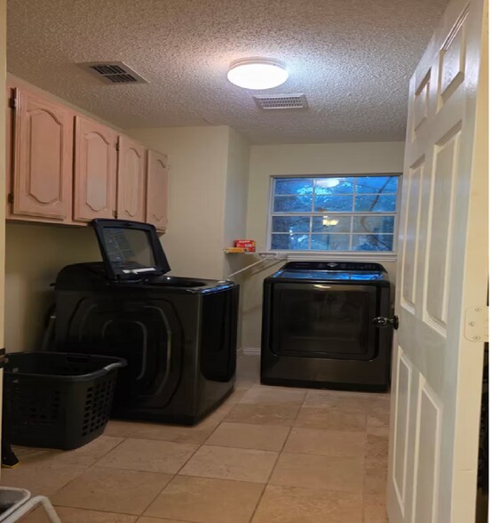 Make daily routines feel easier with a convenient first-floor laundry area - 10913 Alexandria Dr