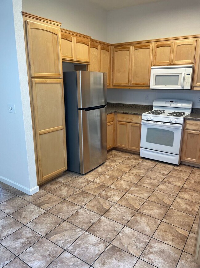 Building Photo - 3 Bedroom, 2 Bathroom House with a 2-Car Garage