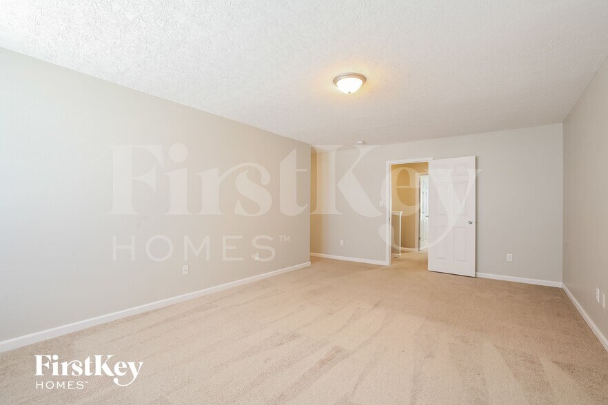 Building Photo - 8107 Grove Berry Way