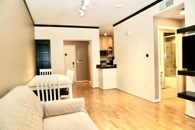 Building Photo - ONE BEDROOM CONDO WITH LUXURY AMENITIES