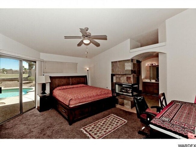 Building Photo - *REDUCED PRICE* Long Term - Unfurnished- Beautiful Golf Course Pool Home!!