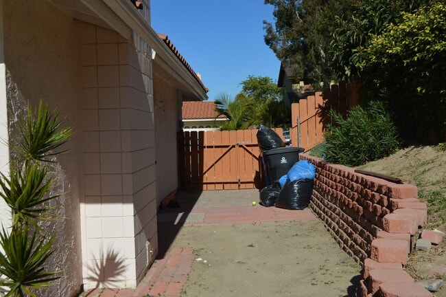 Building Photo - Four Bedroom, Two Bathroom Single Story Home With Two Car Garage