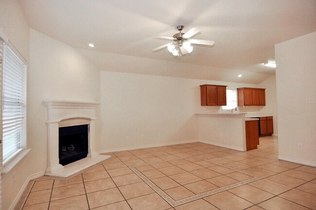 Building Photo - "Warm And Welcoming 3-2-2 With Open Living In a Prime Location!"