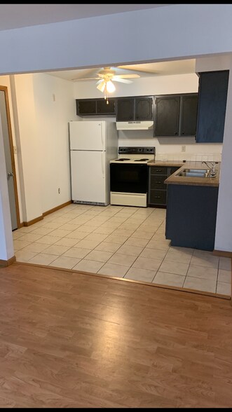Kitchen with tile flooring - 20427 W Clark Ave