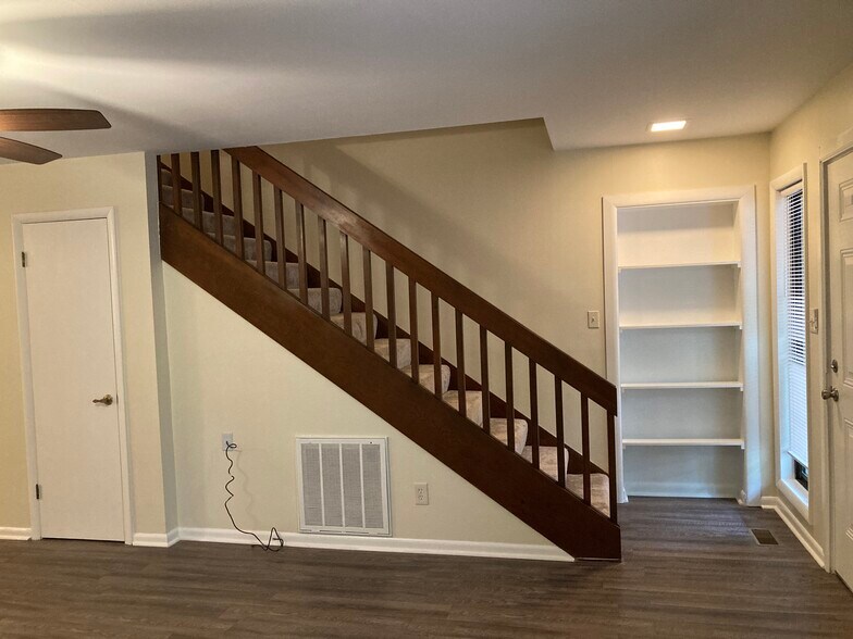 Stairs, have stackable washer/dryer underneath. At entrance are nice new custom built shelves jus - 185 Eagle Peak Cir