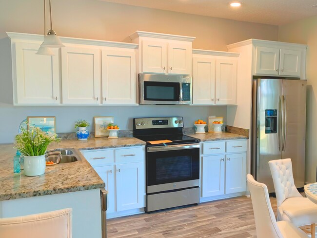 Building Photo - 303 Four Seasons Dr