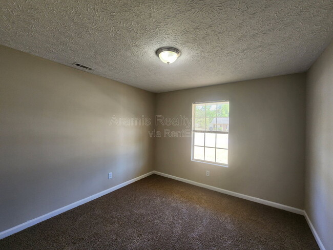 Building Photo - 5477 Denny Dr