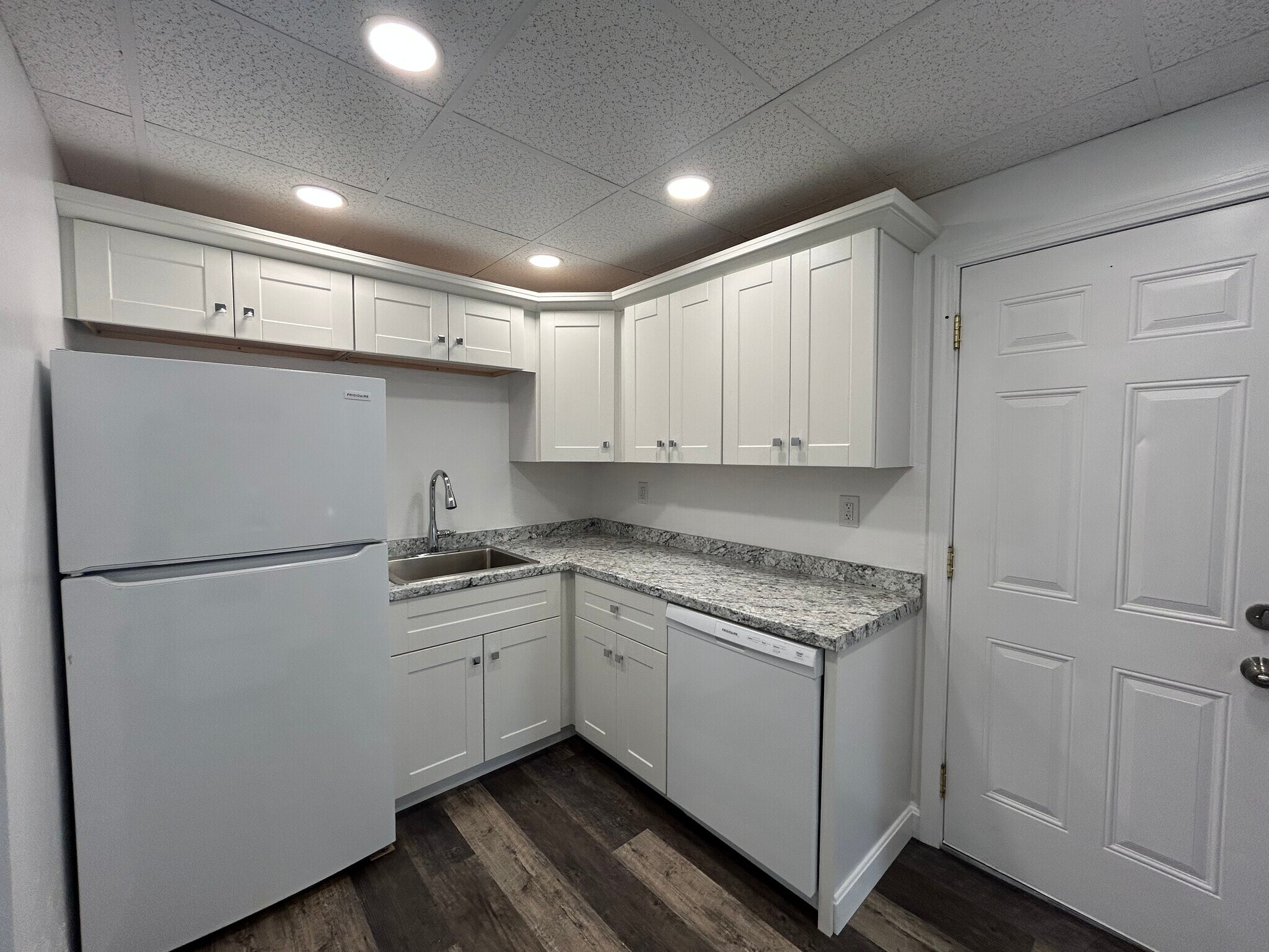 New kitchen features dishwasher and soft close doors. - 25 3rd St
