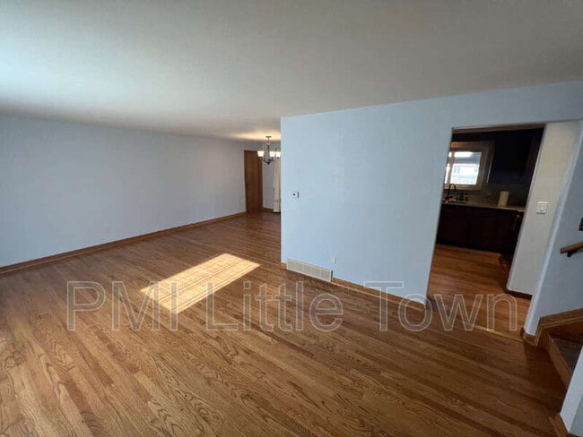 Building Photo - 5001 W Tufts Ave