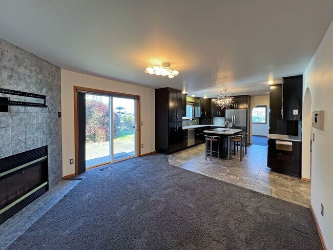 Building Photo - Stunning 4 Bedroom 2.5 Bath with Peek-a-Boo View of Puget Sound