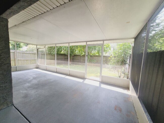 Building Photo - LOVELY 3/2 w/ Screened Porch, New Carpet in Bedrooms, Washer/Dryer, & Privacy Fenced Yard! Includ...