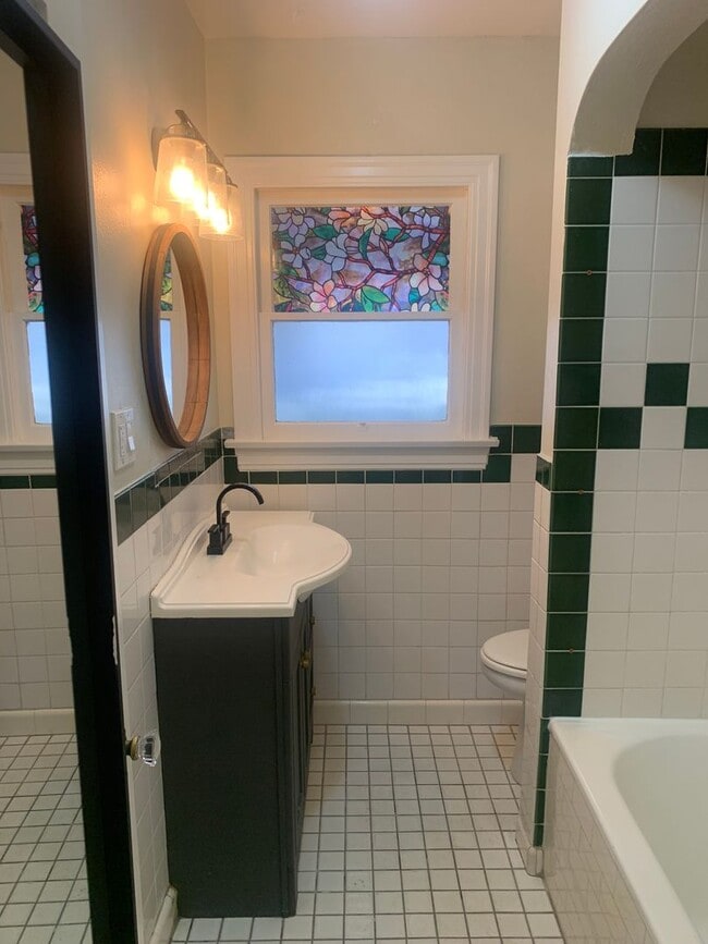 Building Photo - Fully gated Charming craftsman Two bedroom...