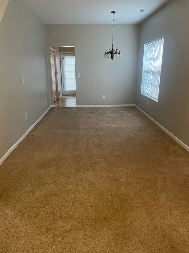 Building Photo - This two-story, 4-bedroom, 2-bath duplex in Fort Mill, SC sits on a corner lot