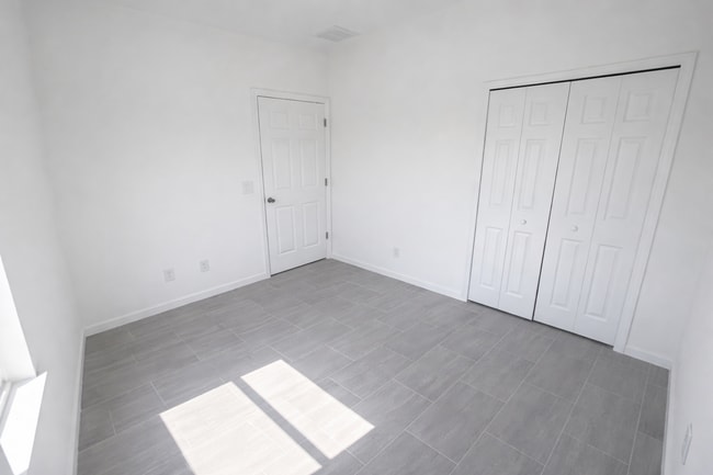 Building Photo - NEW CONSTRUCTION- Modern 3 Bed / 2 Bath Home in Lehigh Acres