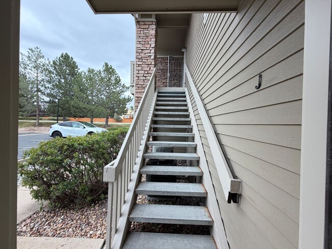Building Photo - Remodeled Top-Level Condo in Pool Community Near Shopping & Dining