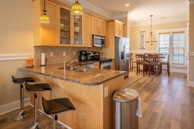 Building Photo - ENJOY OCEAN BREEZES FROM THIS FURNISHED OFF-SEASON OCEAN VIEW CONDO W/BALCONIES