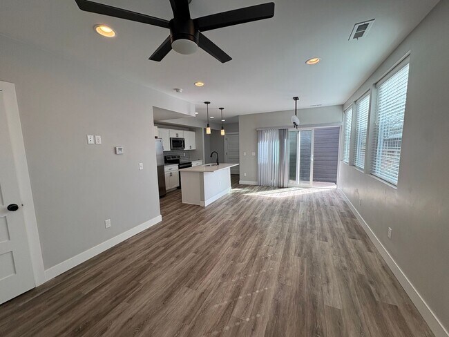 Building Photo - Modern 2 Bed + Flex Townhome with Rooftop Deck Near Paco Sanchez Park & Light Rail