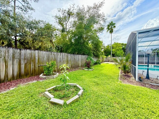 Building Photo - Executive 4bedrooms/3baths Dream pool-home...
