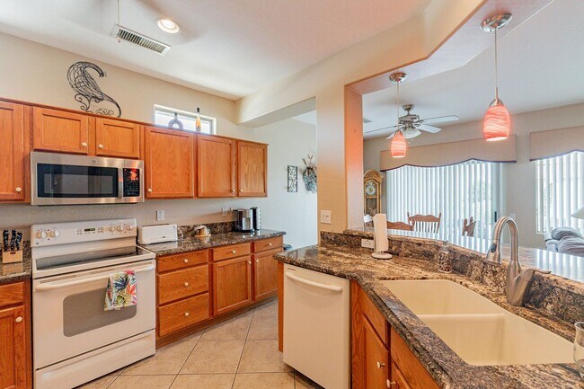 Building Photo - STUNNING Home with New AC in Exclusive 'Th...
