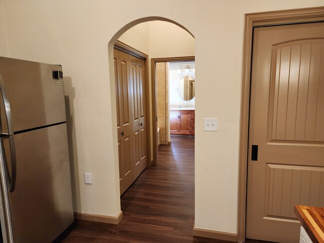 Looking toward laundry from kitchen - 504 Kelly Rd