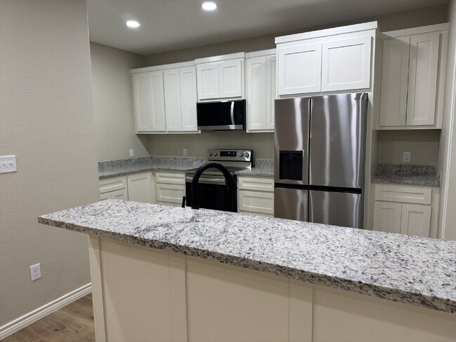 Building Photo - New 4BR/2.5BA Home – Perfect for Roommates, Walk to Campus!