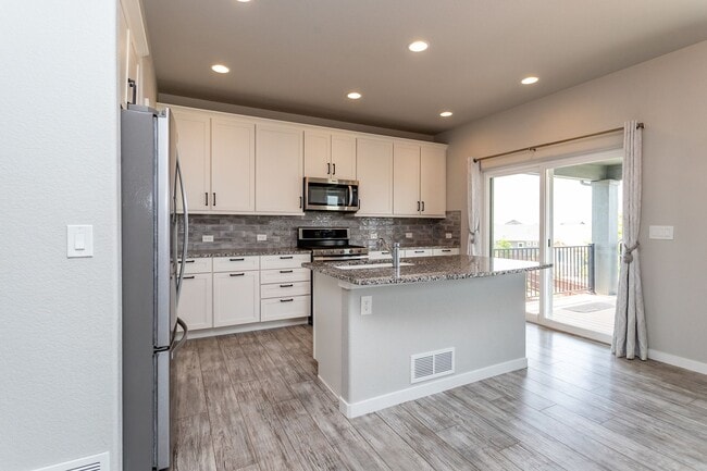 Building Photo - Spacious 5-Bedroom Home with Finished Base...