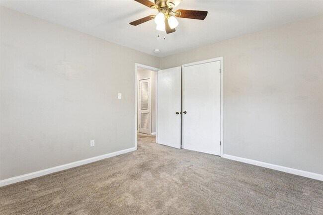 Building Photo - Charming brick rancher with modern kitchen...