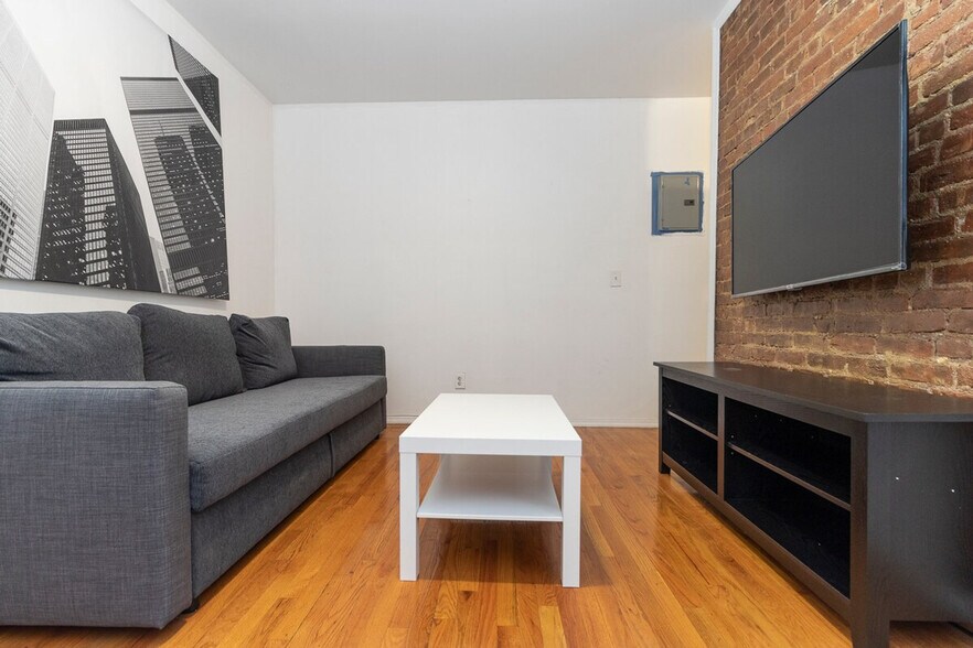 Building Photo - 309-311-311 E 95th St