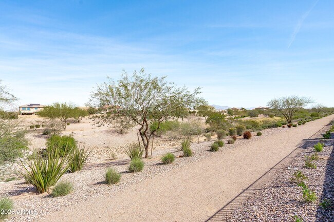 Building Photo - 10812 E Tesla Ave