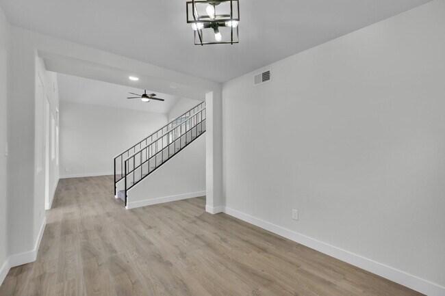 Building Photo - Step into this charming 3-bedroom, 3-bathroom home that has so much to offer!